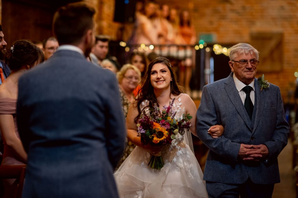 Bride walking down aisle