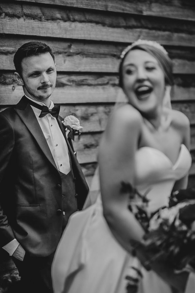 Groom looking at bride