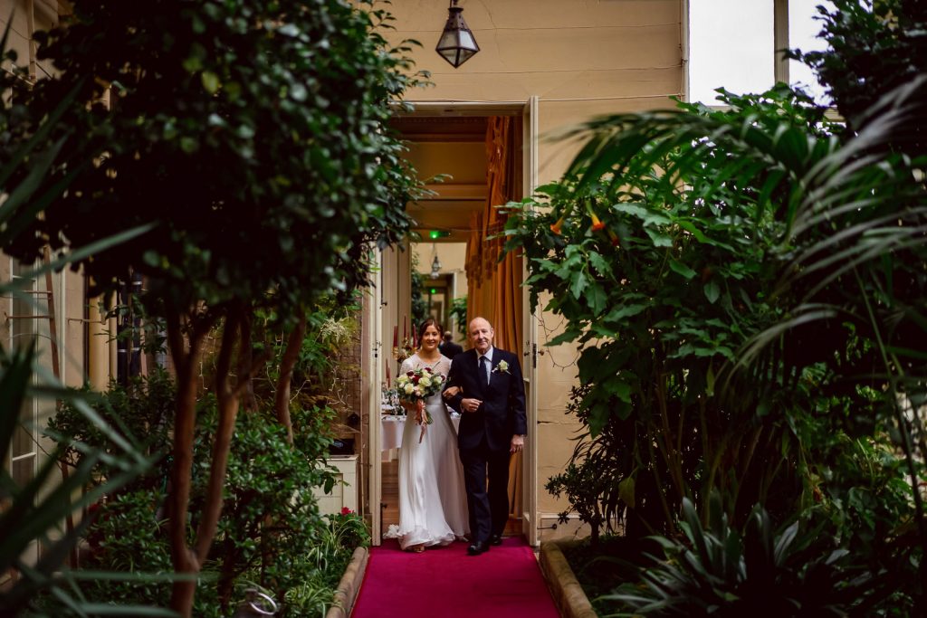 Bride walks to the alter