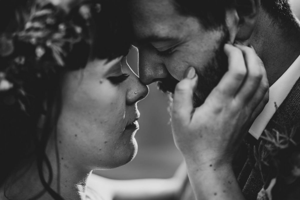 Bride and groom kissing