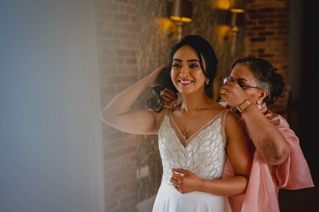 Bride getting ready with mother