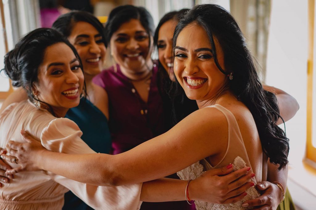 Bride getting ready with sisters