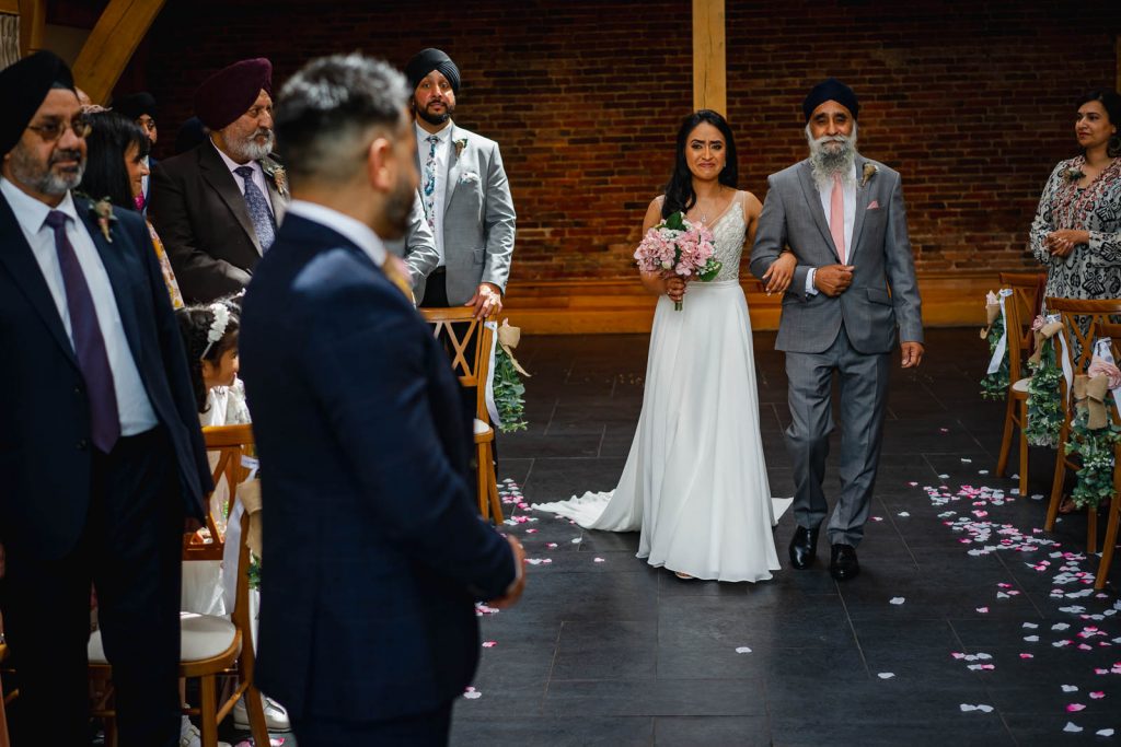 Bride coming down aisle