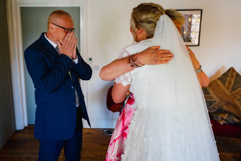 Bride with parents first look