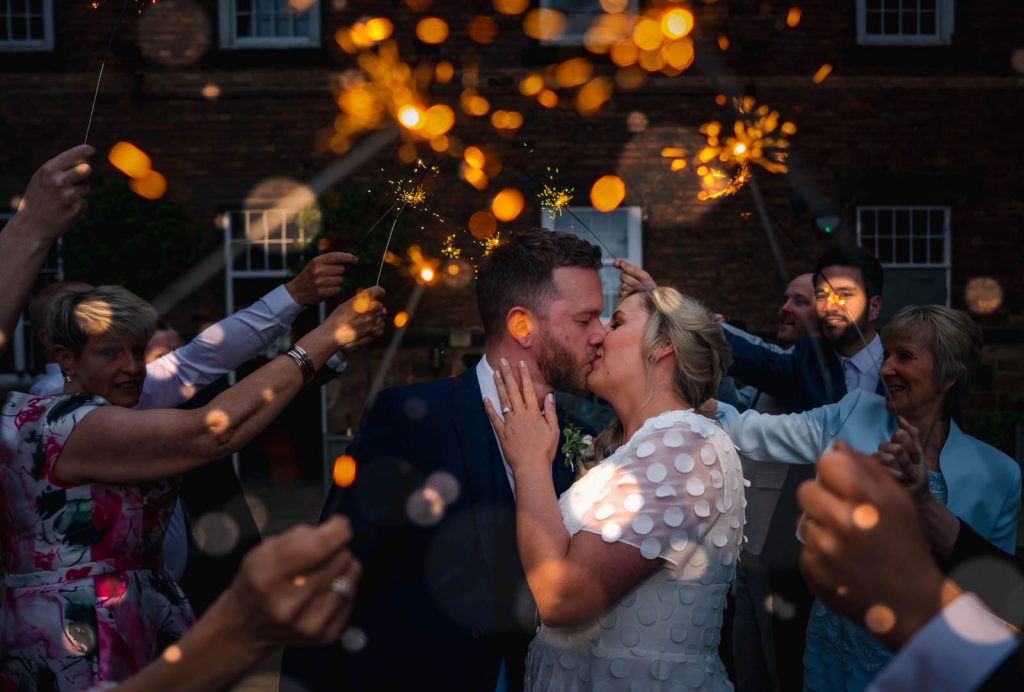 Bride and groom with sparklers