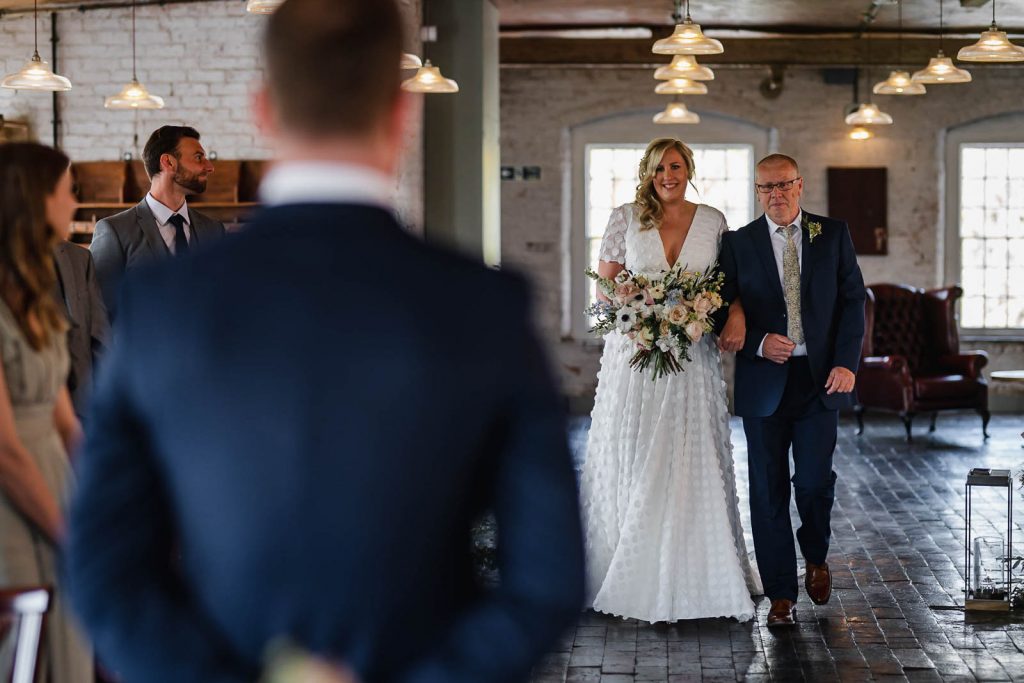 Bride walking down aisle