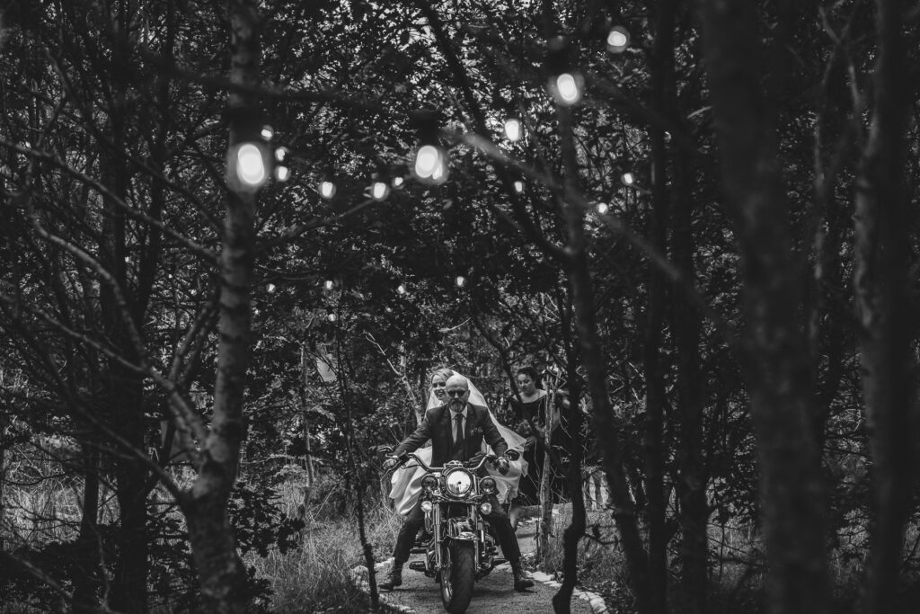 Bride arriving by bike