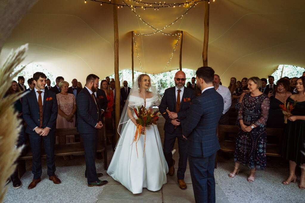 Bride coming down aisle