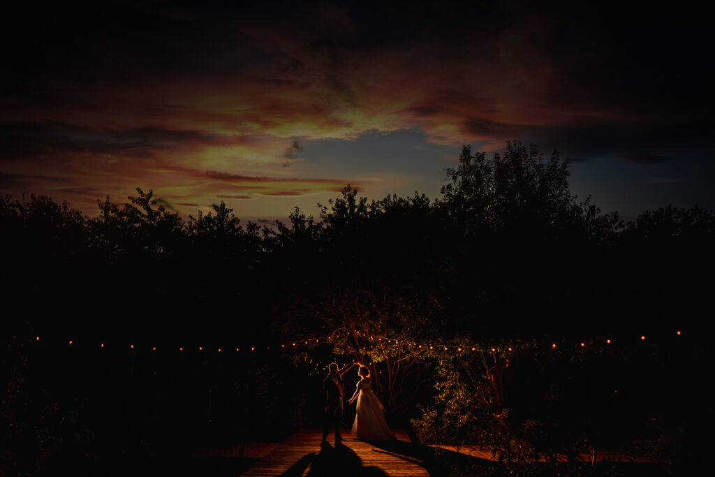 Bride and groom at night