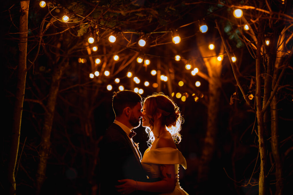 Bride and groom at night