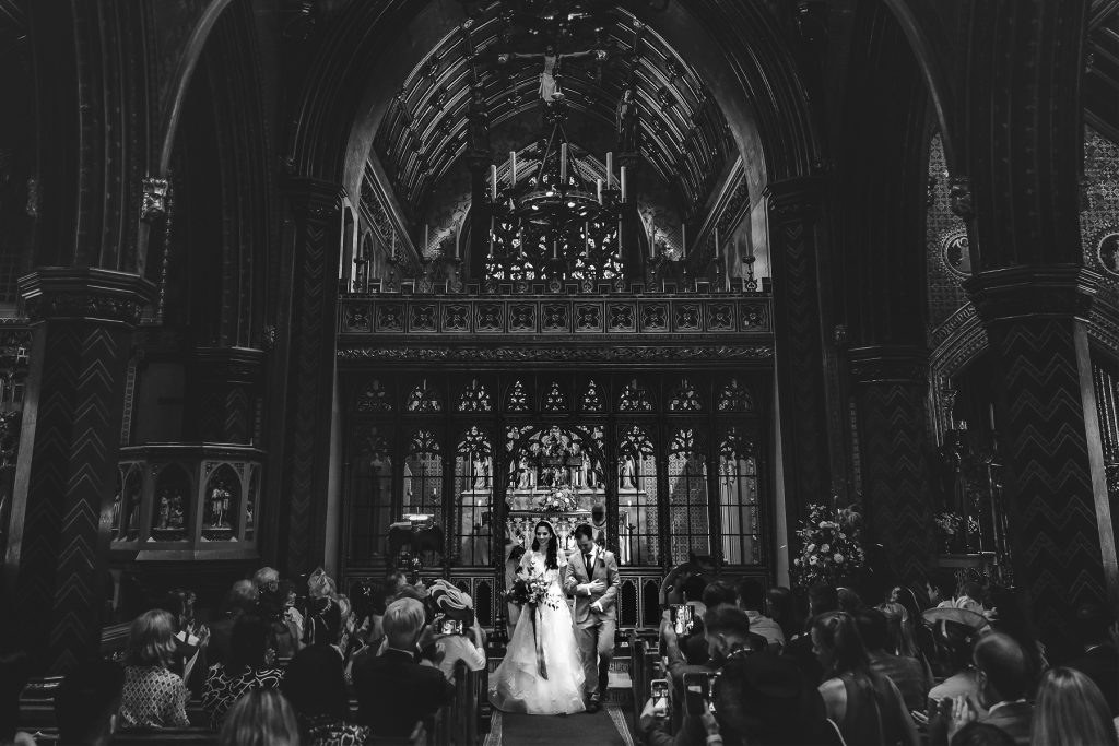 Bride walks from the alter