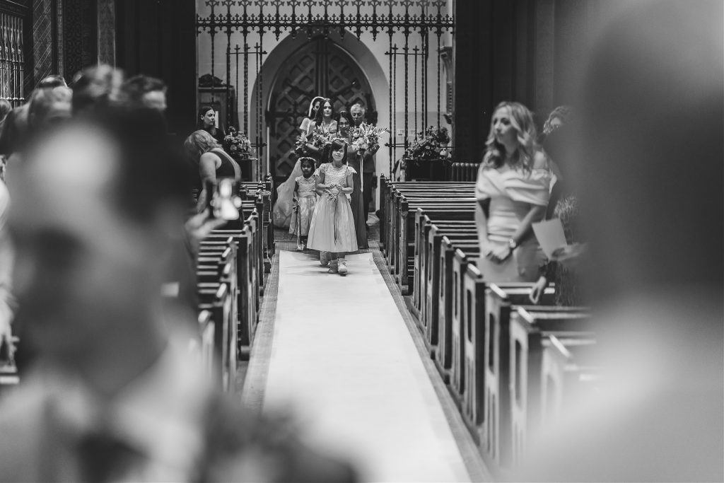 Bride walks to the alter