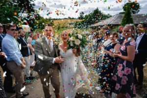 Bride and groom with confetti