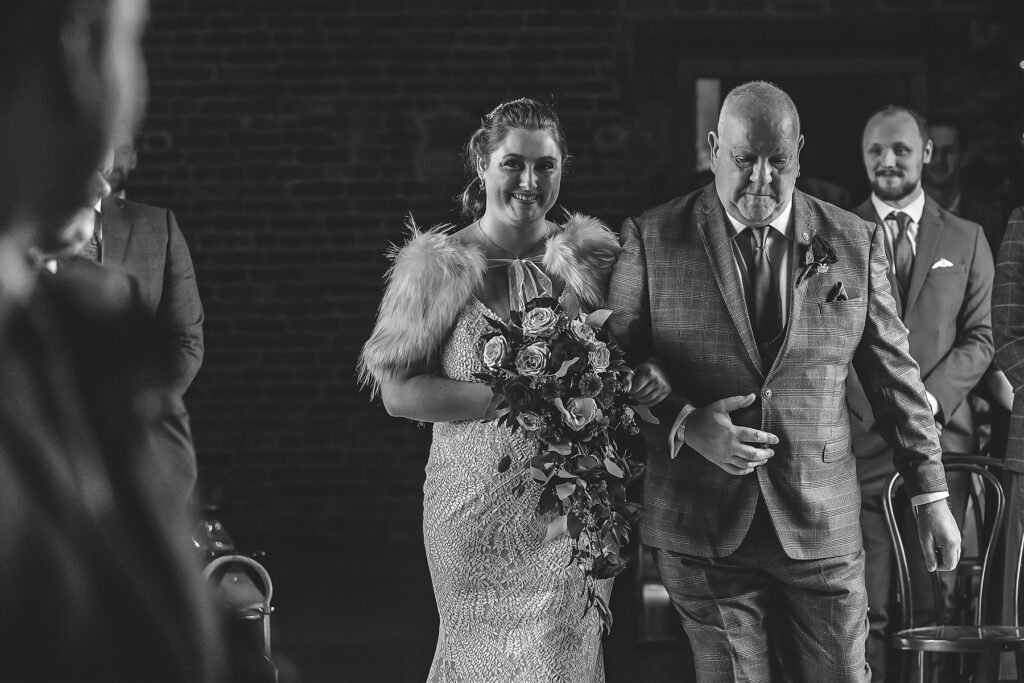 Bride arriving with dad