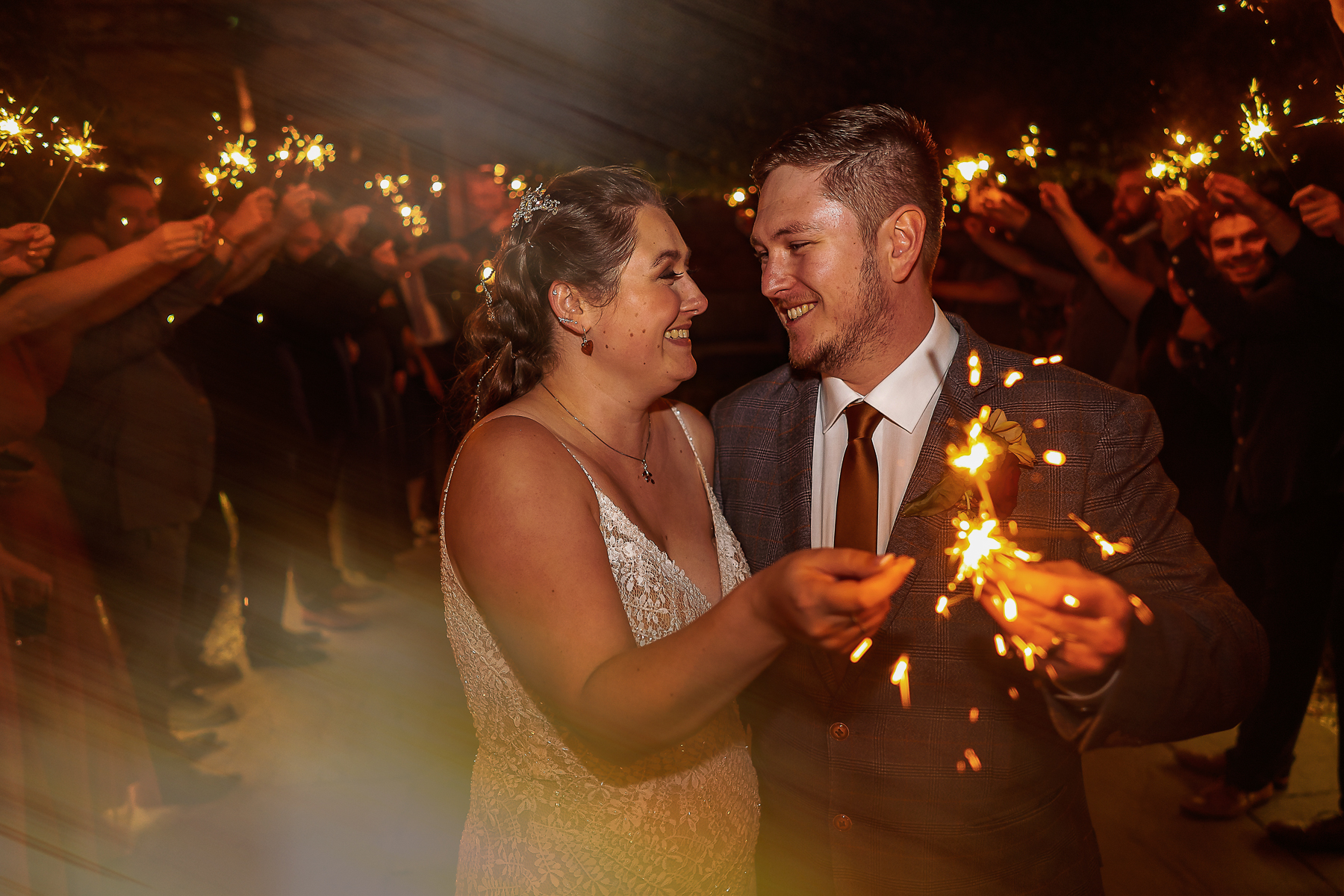 Wedding couple with sparklers at Hazel Dean Gap