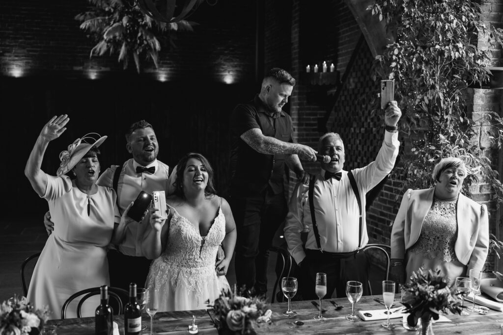 Singing waiters at wedding reception