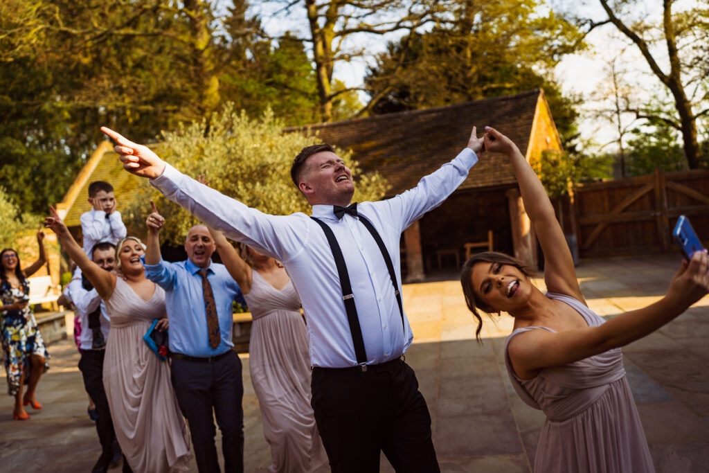 Singing waiters at wedding reception