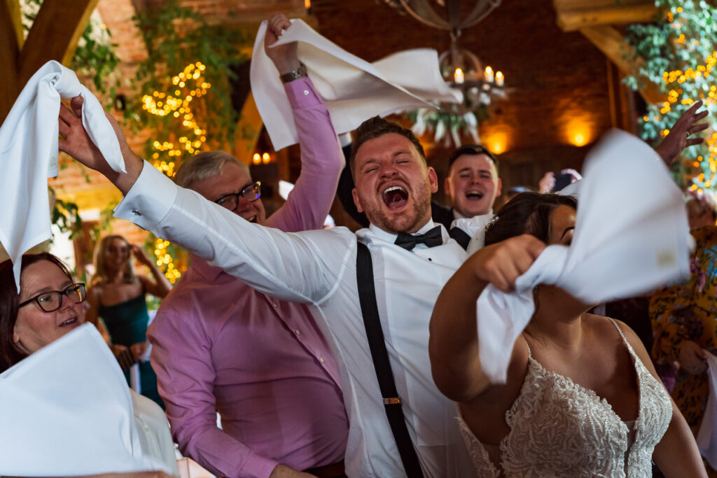 Singing waiters at wedding reception