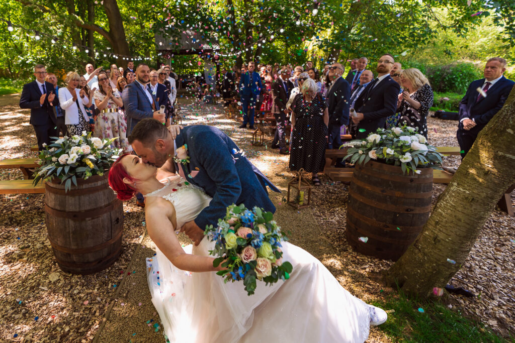 Couple having a dip kiss