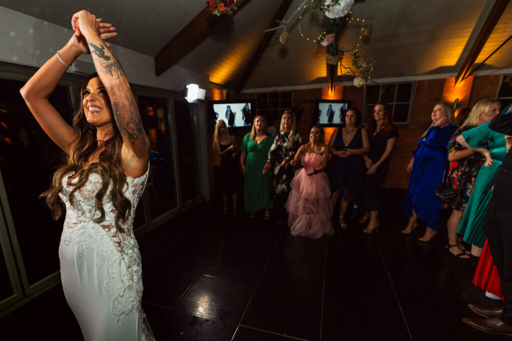 Bride throwing her flowers