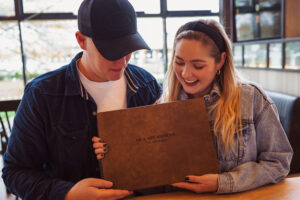 Wedding couple with album