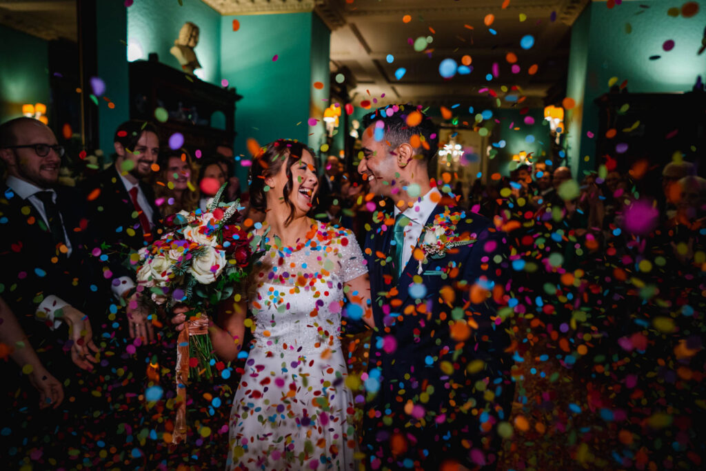 Wedding couple in confetti