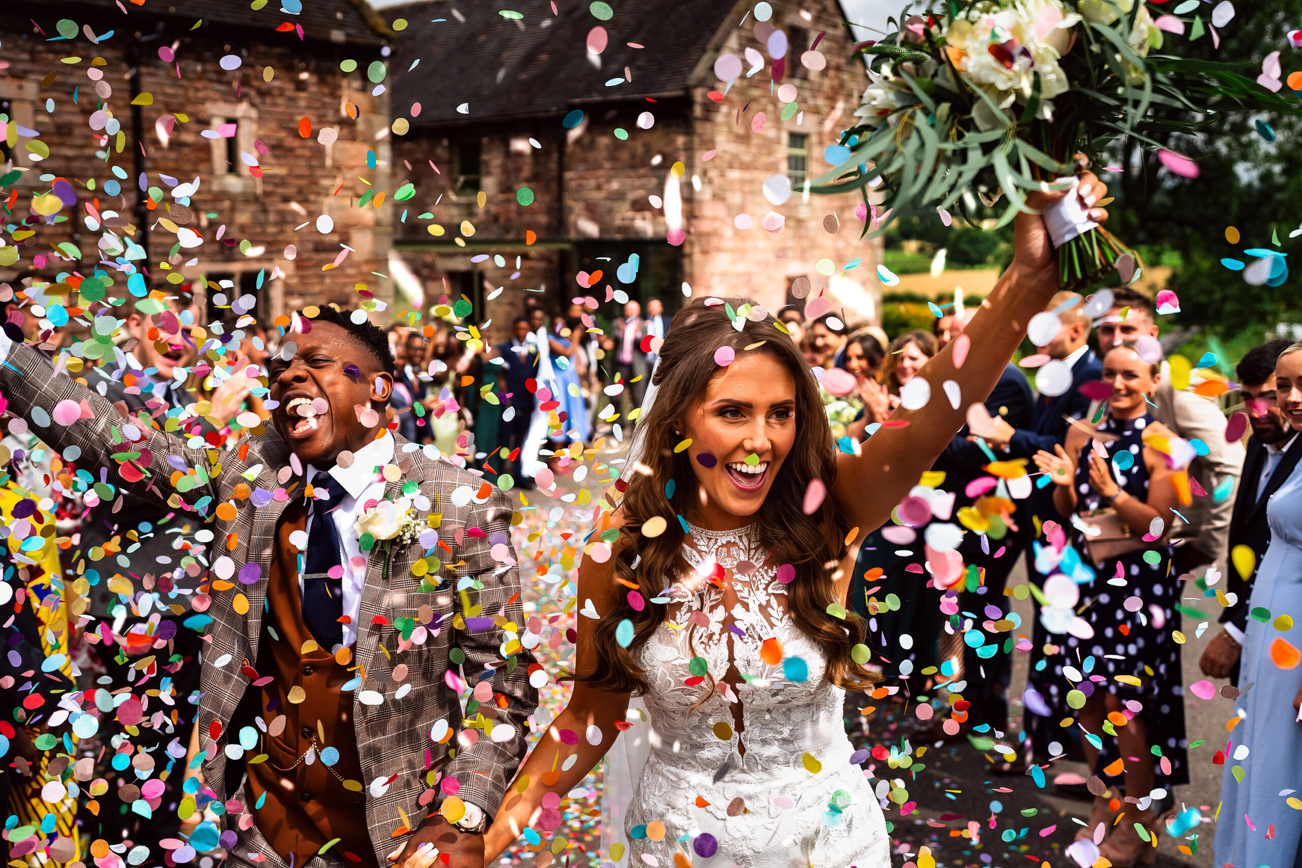 Couple in wedding confetti