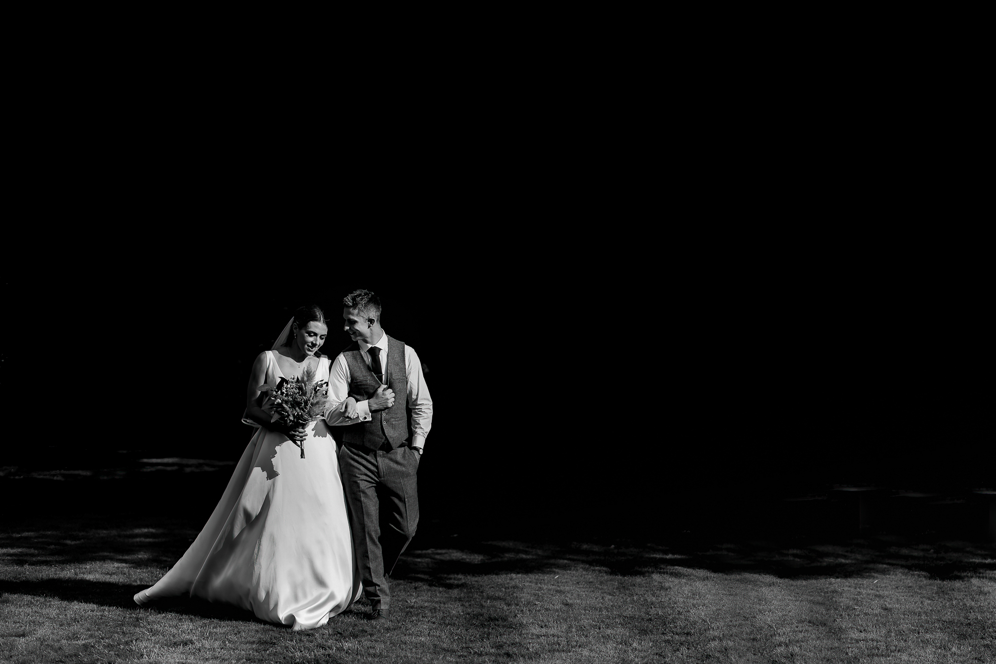 Couple walking on wedding day