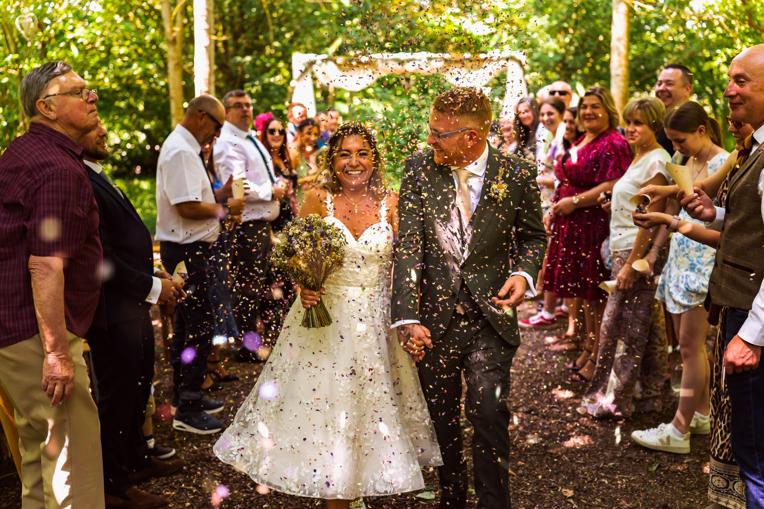 Wedding couple with confetti