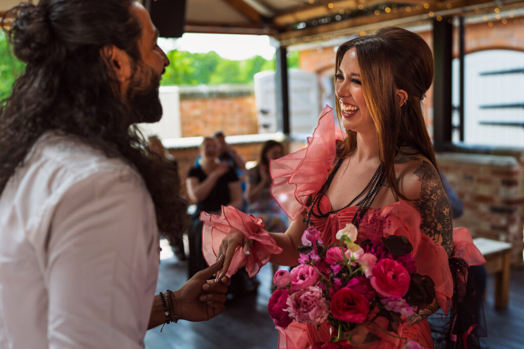 Boho Wedding Photography ring going on finger