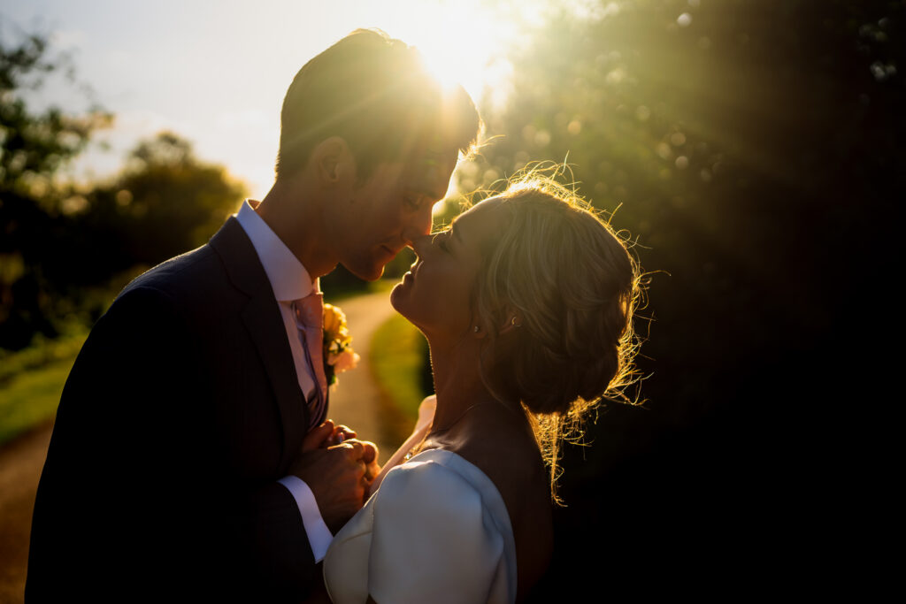 Couple at Shustoke Barn in the sunset